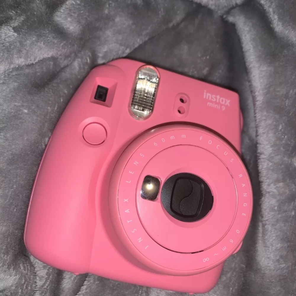 pink polaroid Fujifilm camera